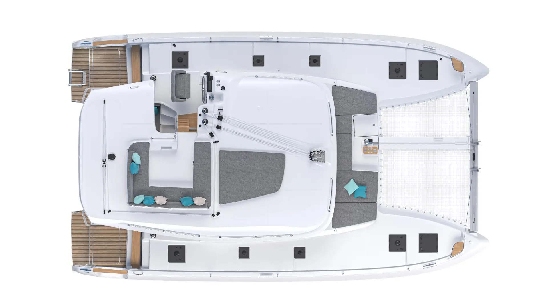 Top-down view of a modern catamaran yacht with gray and white deck, seating areas with cushions, twin helm stations, sunbathing areas, and wooden steps at the stern for boarding.