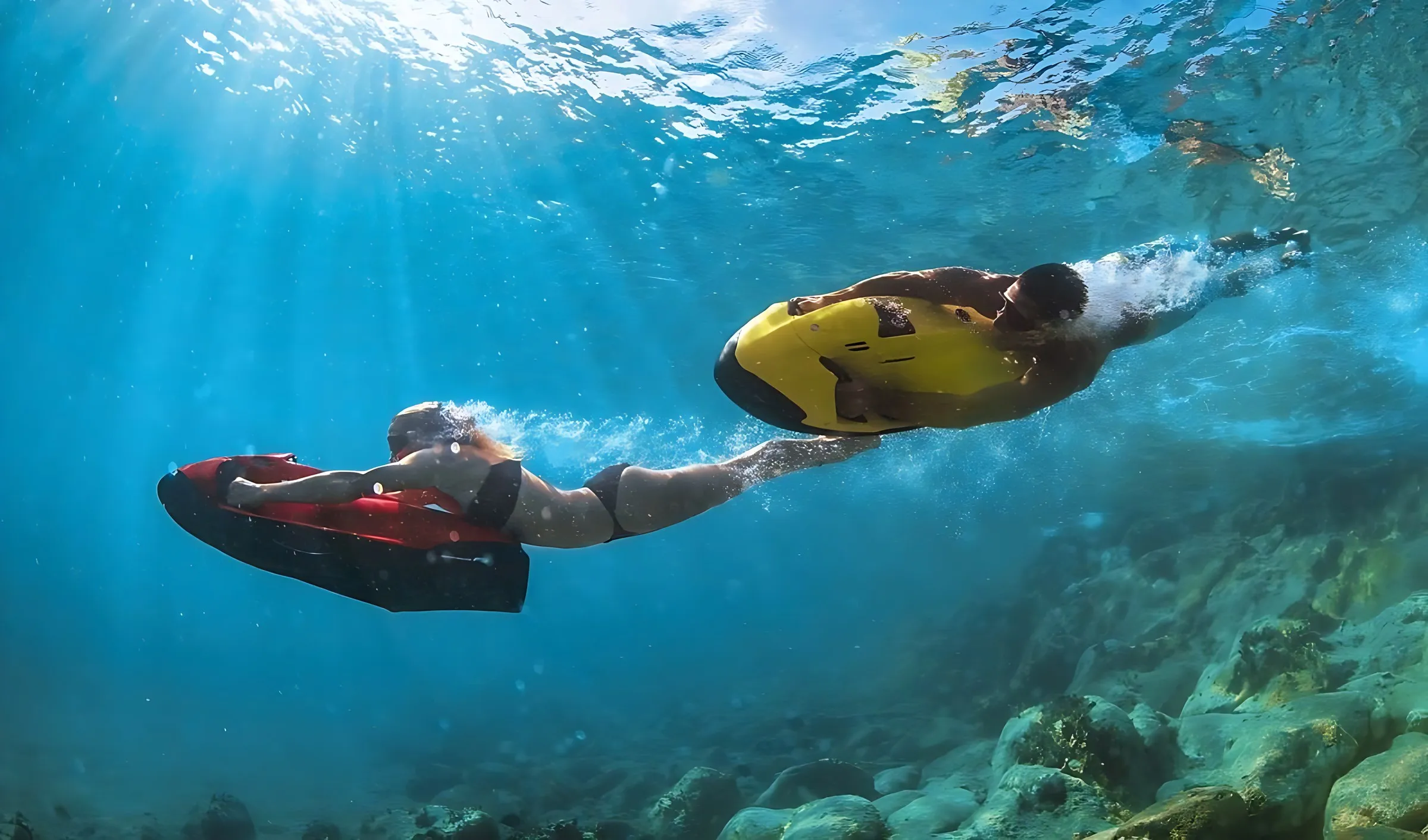 Seabob gliding underwater in clear blue sea